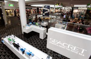 Customers at Seacret kiosk