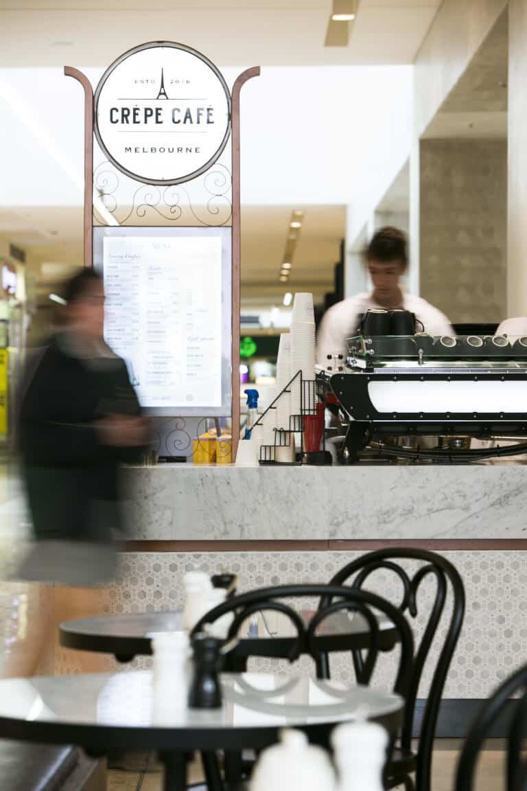 Crepe cafe board and staff.