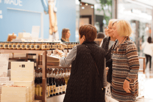 Customers taking a look at products