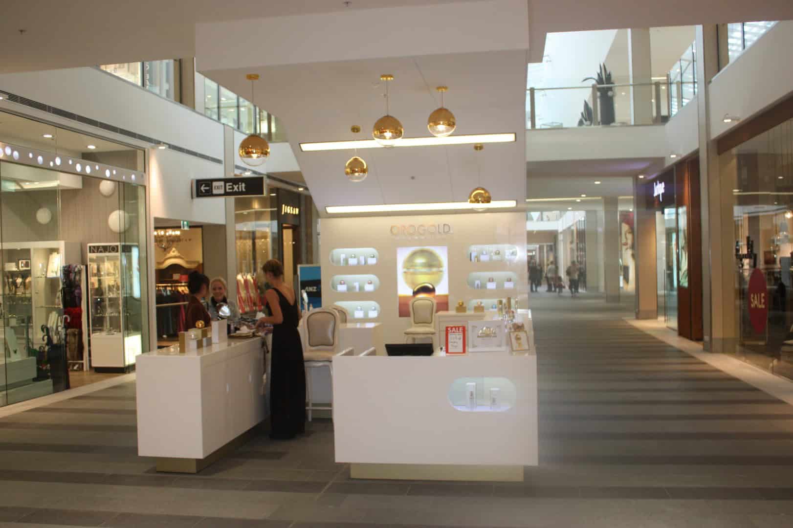 staff assisting customer at Orogold.